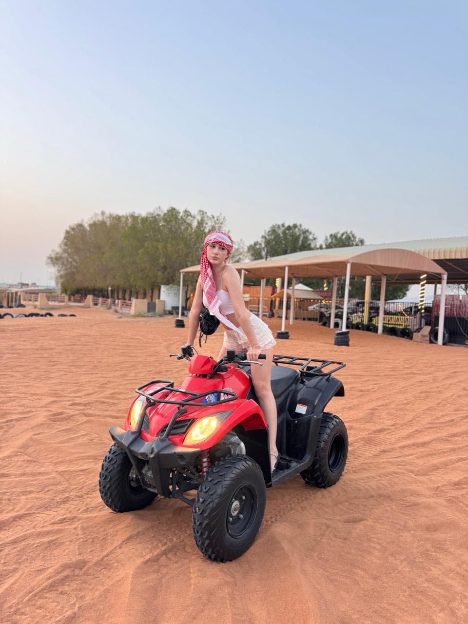 Guest posing in the dunes